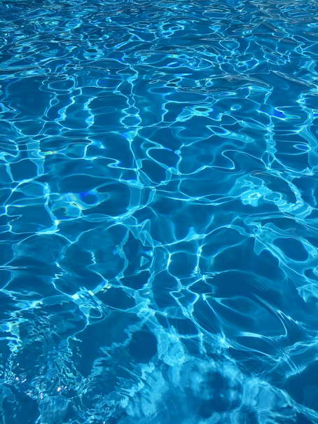 Blue water in swimming pool