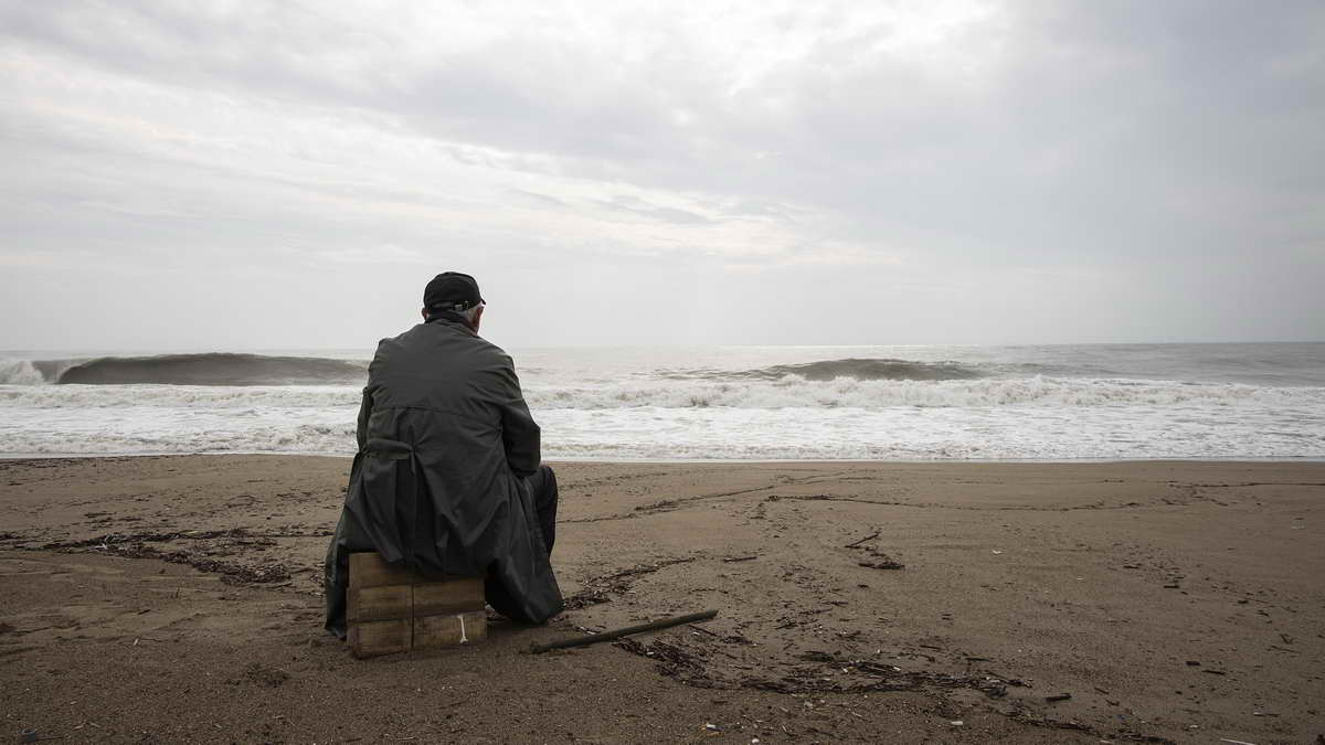 Lonely man on a beach